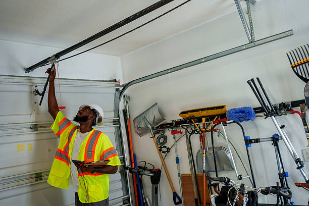 Professional Garage Door Panel Replacement technician working in Ponca City, OK